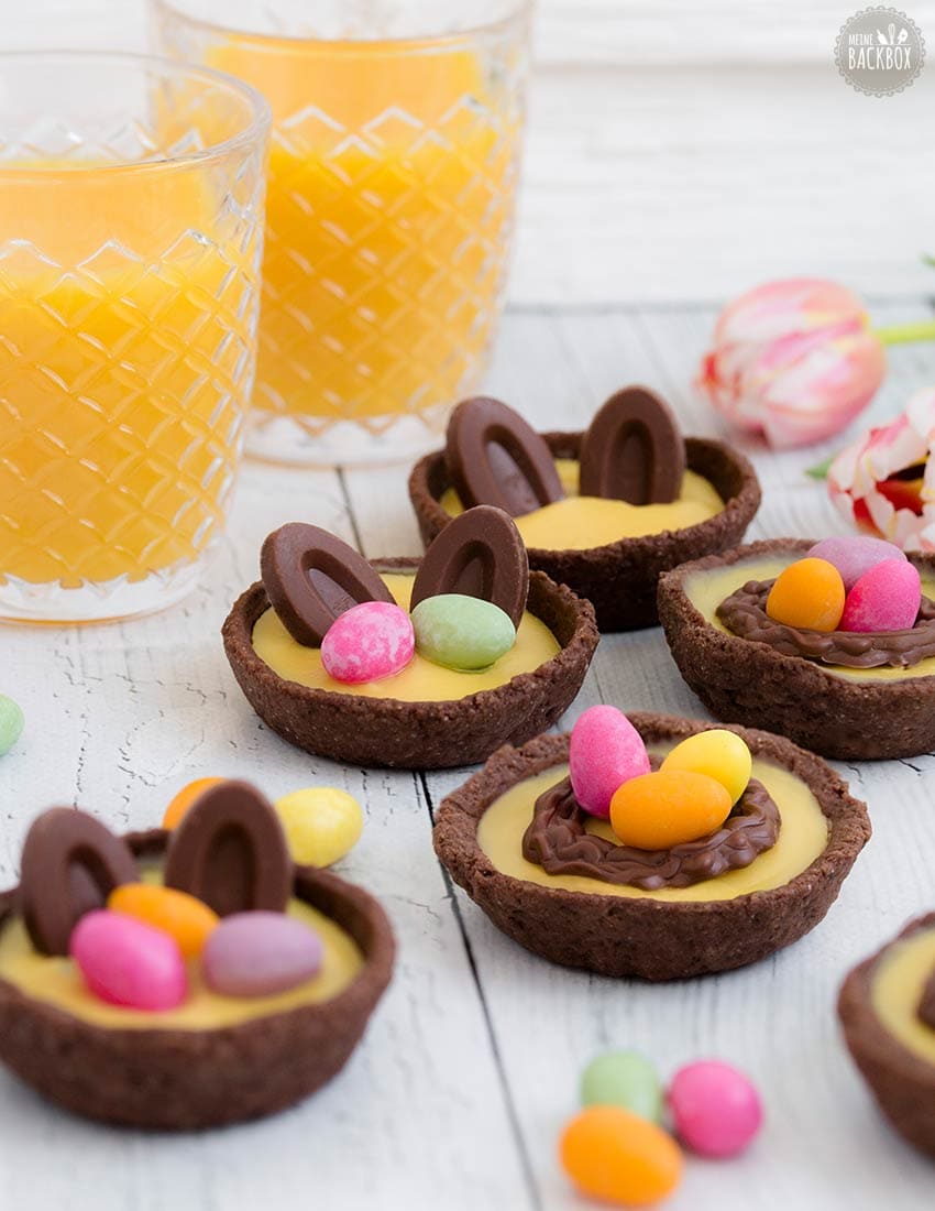 Osternest Tartelettes – Dunkler Mürbeteig mit Orangencreme